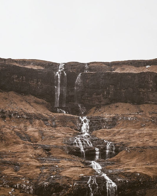 Rugged Landscape with Waterfall